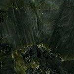 A close up of a green marble texture.