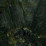 A close up of a green marble texture.