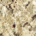 A close up of a granite counter top with brown spots.