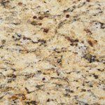 A close up of a yellow granite counter top.