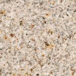 A close up of a granite counter top with a grainy texture.