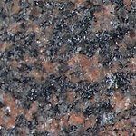 A close up of a granite counter top.