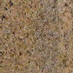 A close up of a brown granite counter top.