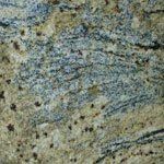 A close up of a granite counter top with a marble texture.