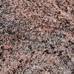 A close up of a granite counter top.