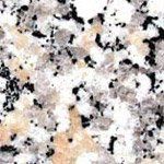 A close up of a granite counter top with black and white spots.