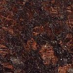 A close up of a brown granite counter top.