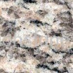 A close up of a granite counter top with a marble texture.