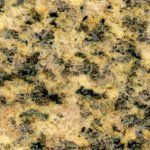 A close up of a granite counter top with a lot of small stones on it.