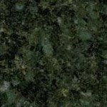 A close up of a green granite counter top.