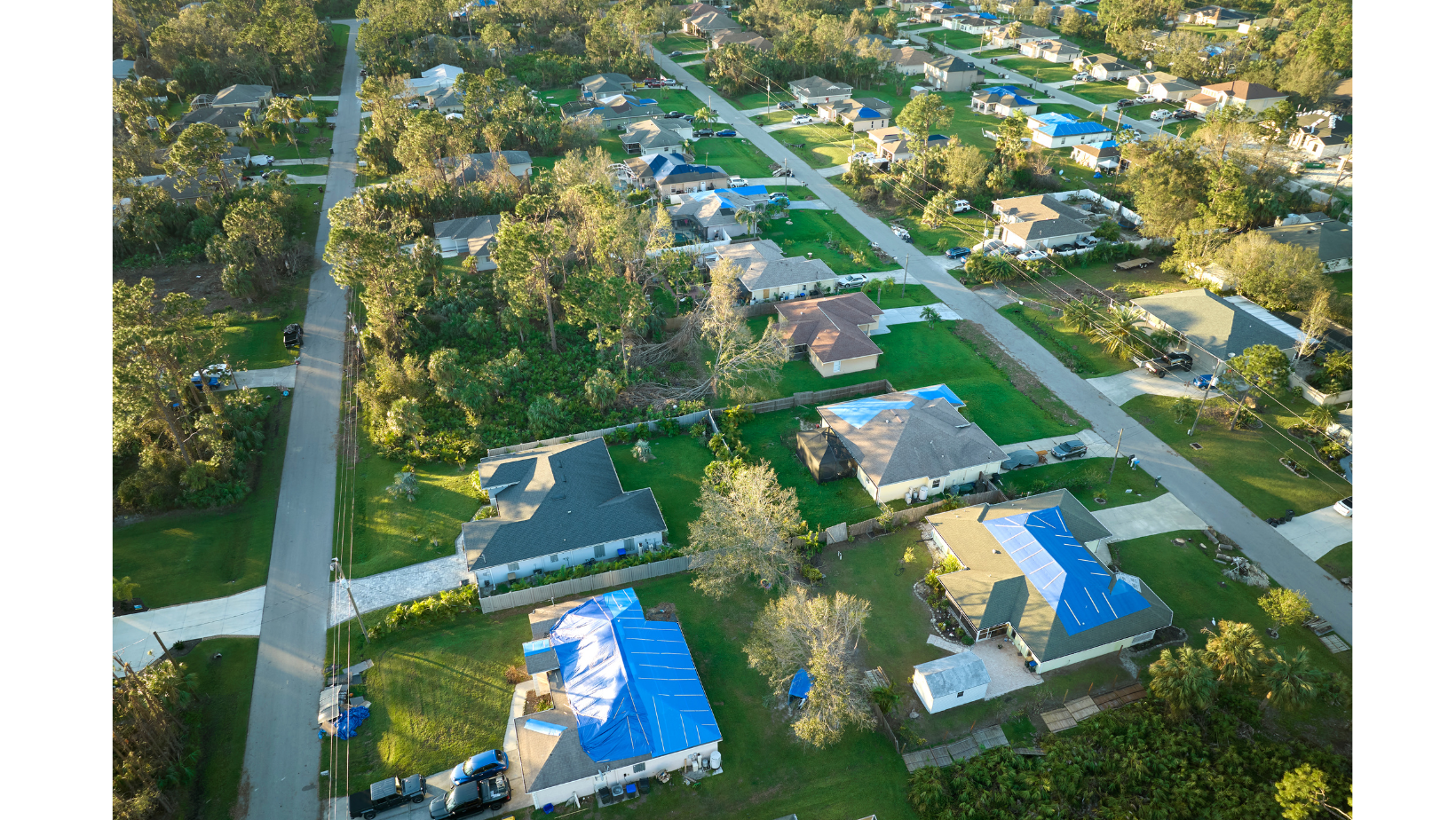 A picture of an aerial view of a  neighborhood that has roof damage to all of the houses in Slidell, LA