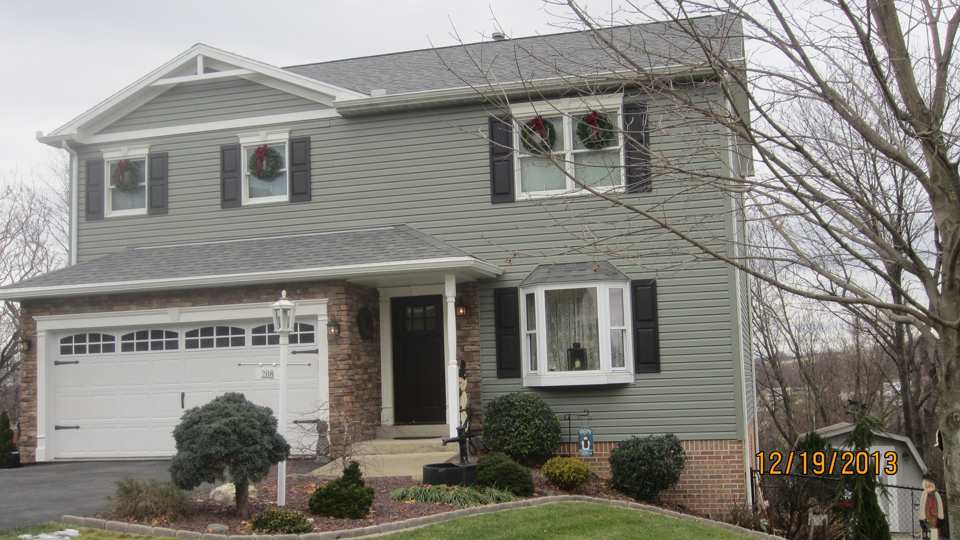 New siding and windows on house - Exterior Remodeling in Deck - Exterior Remodeling Services in Westmoreland County PA