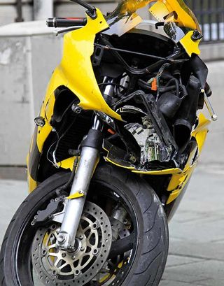 Motor-bike with a broken headlight