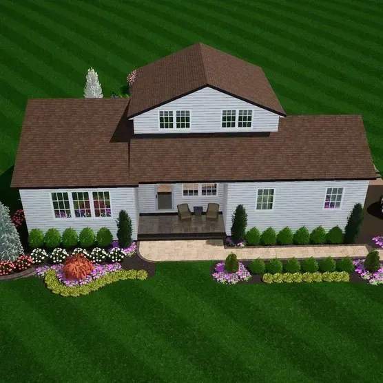 An aerial view of a white house with a brown roof