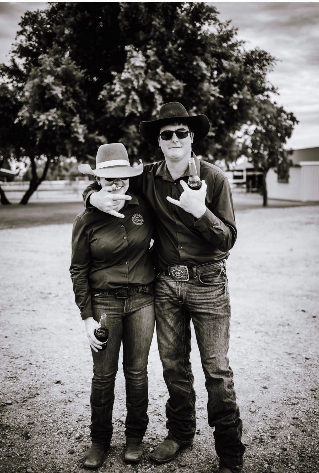 A black and white photo of a man and woman standing next to each other