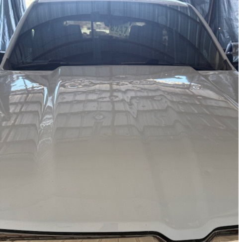 car hood with hail damage 