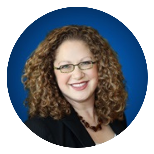 A woman with curly hair and glasses is smiling in a blue circle