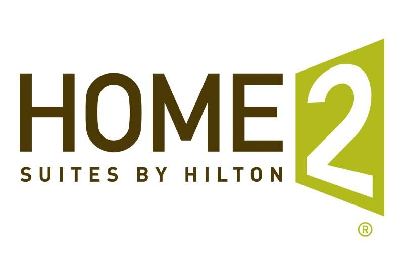 A home 2 suites by hilton logo on a white background