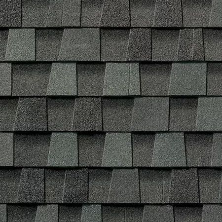 A repeating pattern of dark gray, overlapping asphalt architectural roof shingles.
