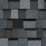 A close up of a row of shingles on a roof.