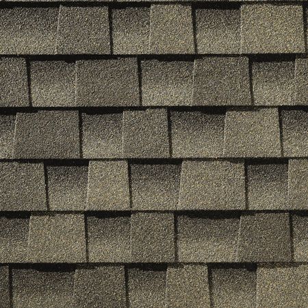 A close up of a roof with shingles on it.
