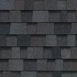 A close up of a roof with shingles on it.