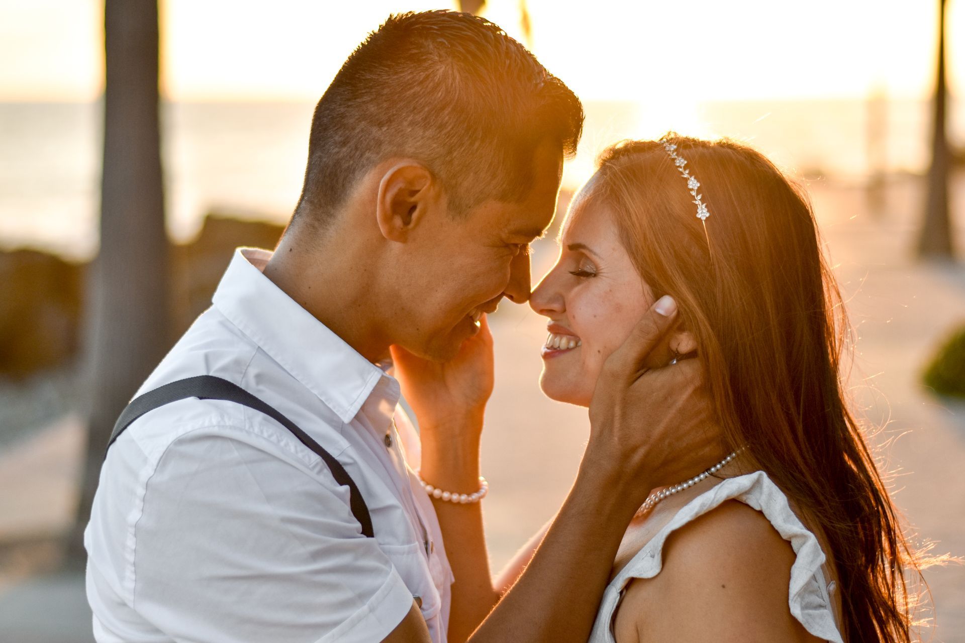A man and a woman are looking into each other 's eyes.