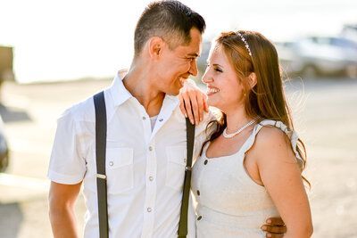 A man and a woman are standing next to each other and looking at each other. Love. 