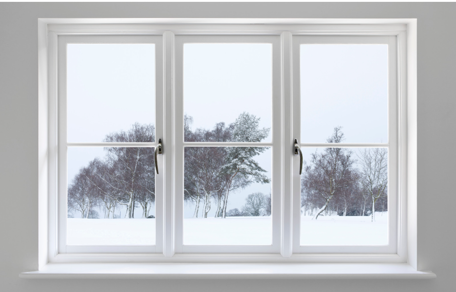 snowy day seen through casement windows