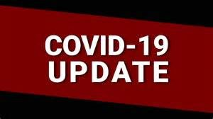 A red and black banner with the words `` covid-19 update '' written on it.