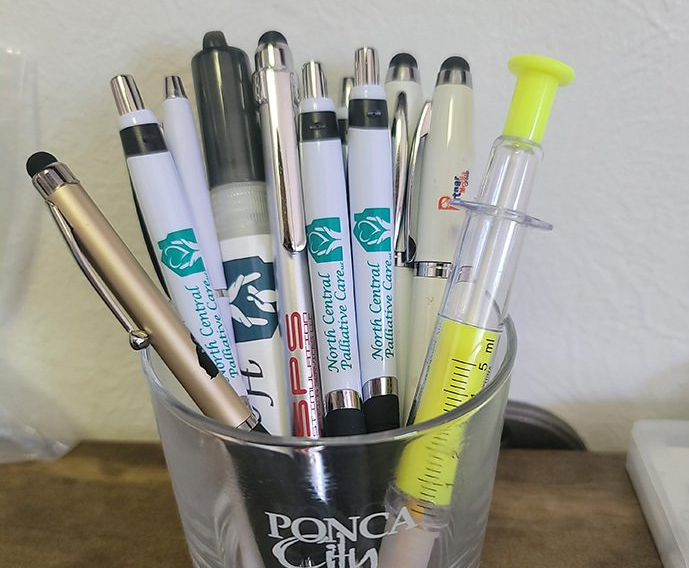 cup full of pens