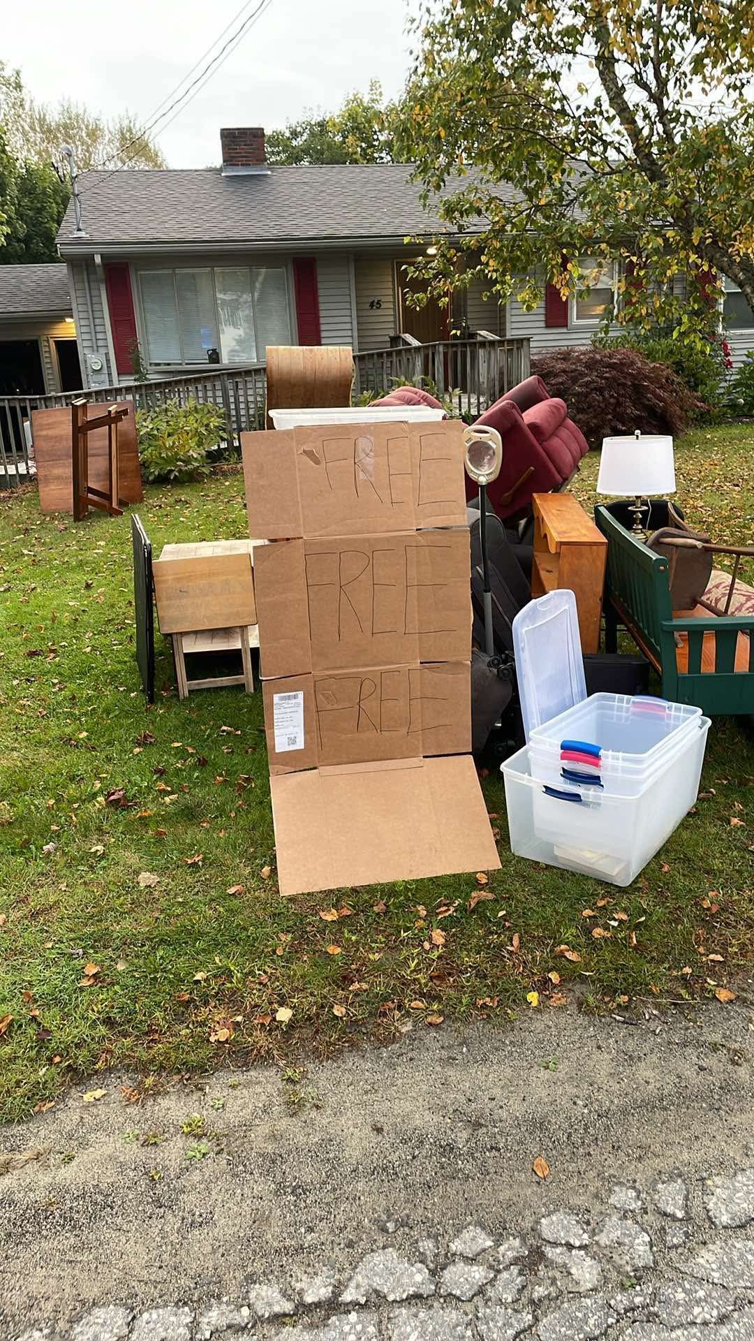 A cardboard sign reading 