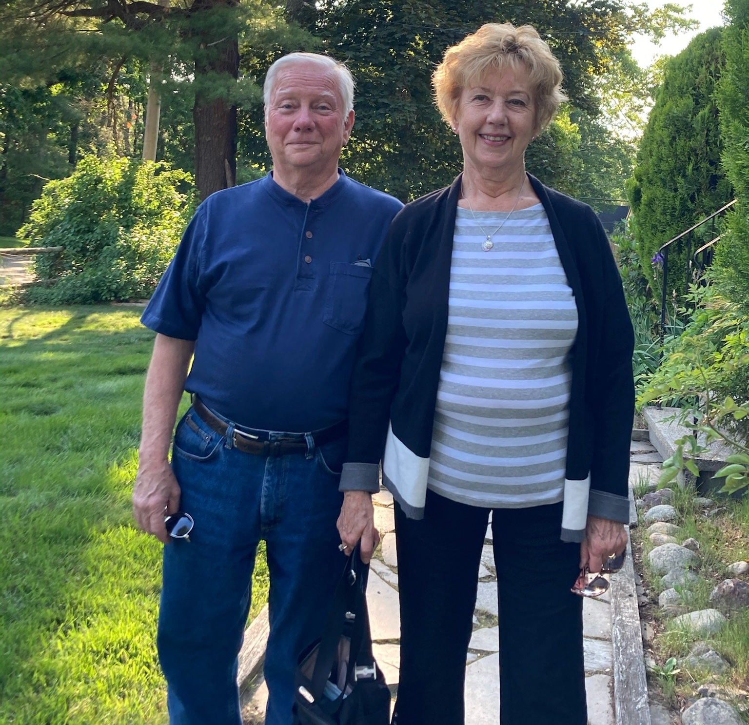 A man and a woman standing next to each other