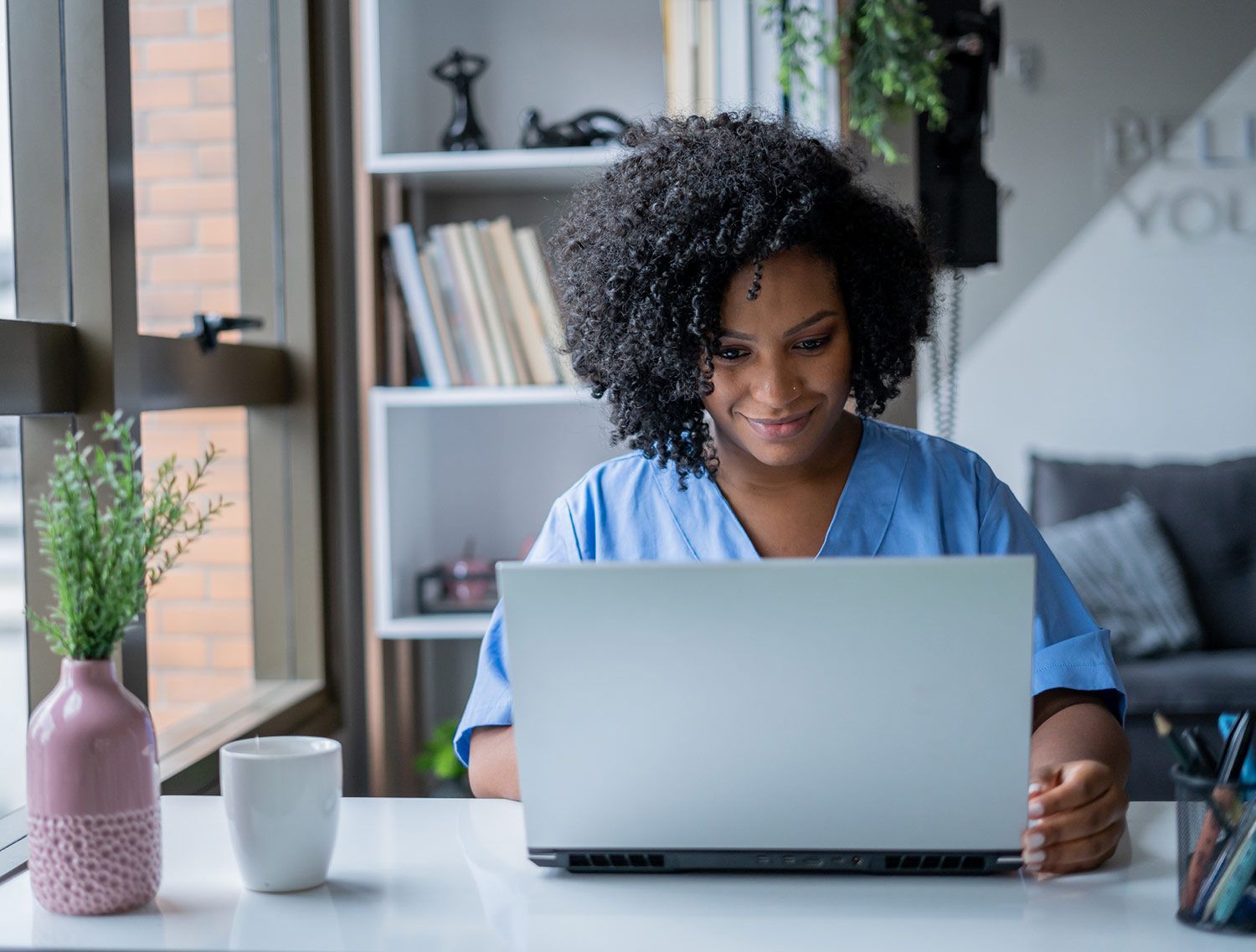 Nurse Checking the Laptop — Houston, TX — Rosewood Career Institute Inc.