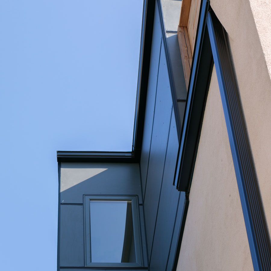 Looking up at a building with a blue sky in the background