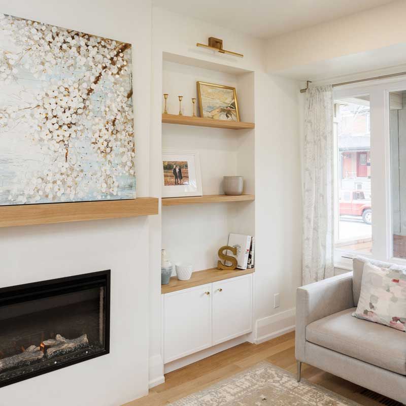 A living room with a fireplace and a couch
