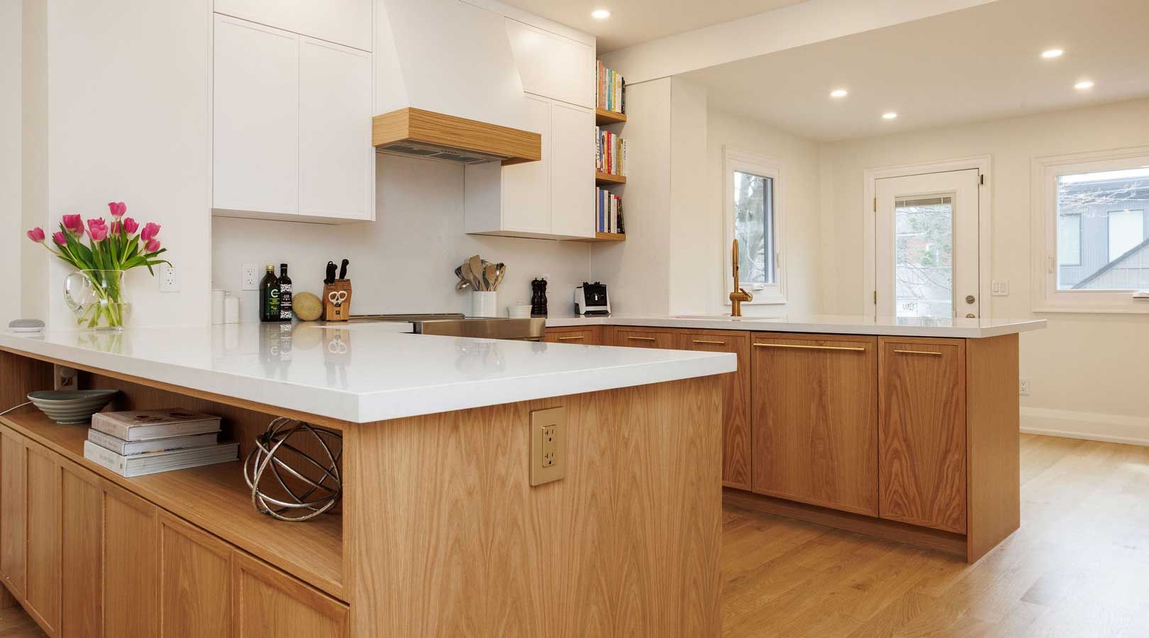 A kitchen with wooden cabinets and a white counter top.