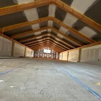 Looking up at the ceiling of a building under construction.