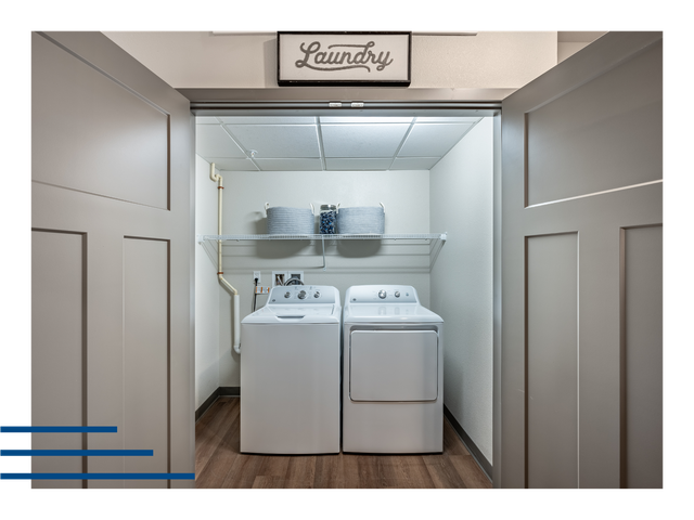 Laundry room closet with a washer and dryer