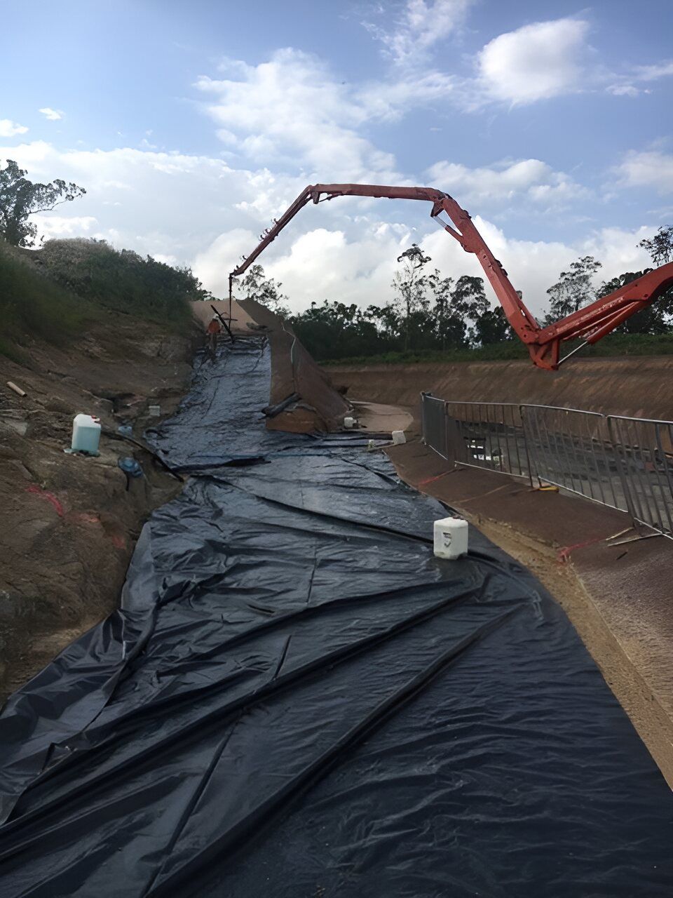 A Construction Site With A Concrete Pump — Flash Concreting Pty Ltd In Nindaroo, QLD