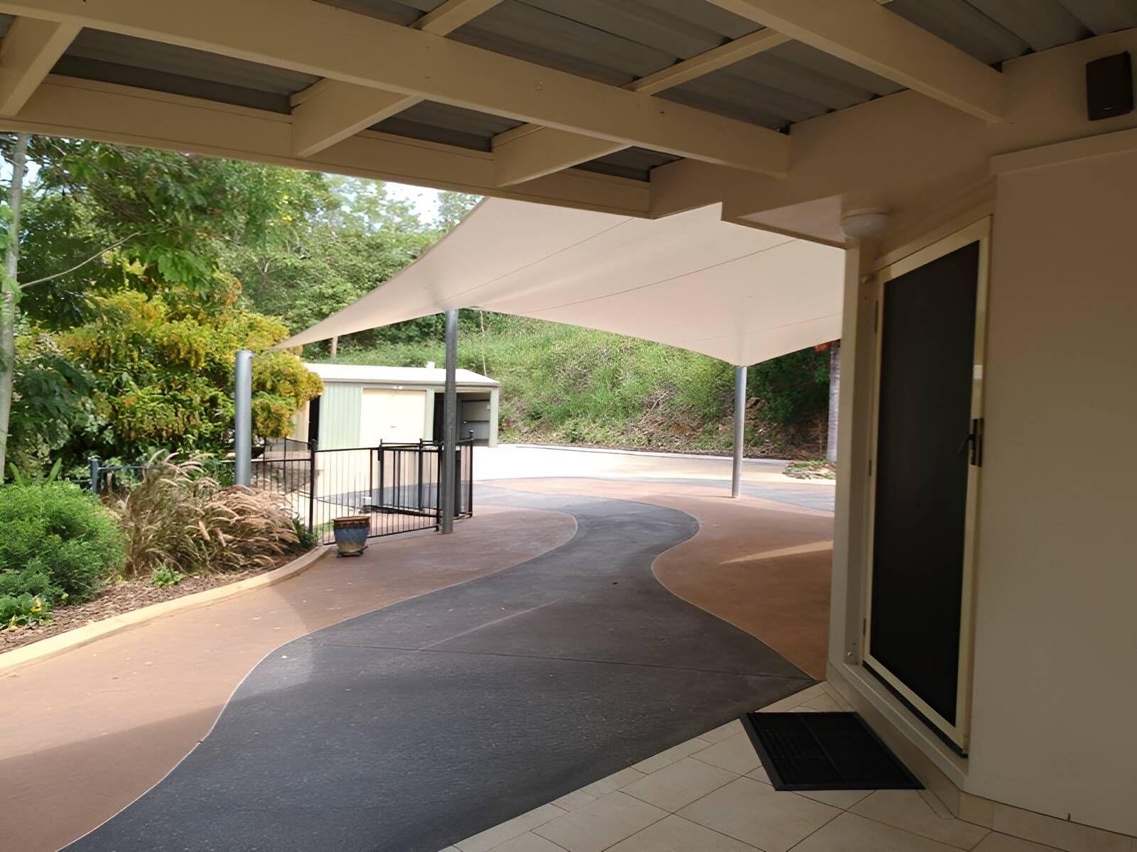 A Covered Walkway With A White Canopy Over It — Flash Concreting Pty Ltd In Nindaroo, QLD