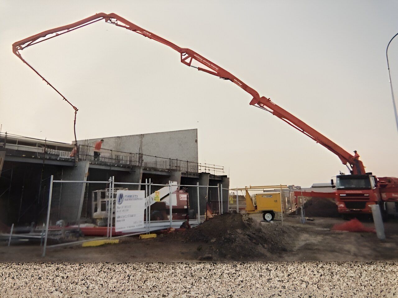 A Concrete Pump Is Being Used To Pour Concrete — Flash Concreting Pty Ltd In Nindaroo, QLD