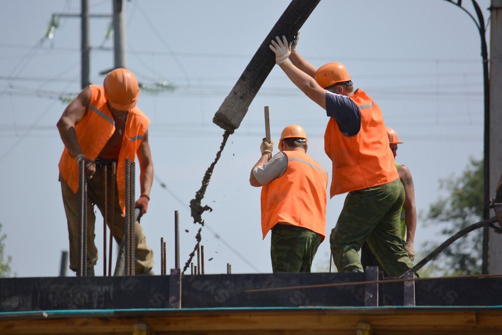 A Group Of Construction Workers — Flash Concreting Pty Ltd In Airlie Beach, QLD
