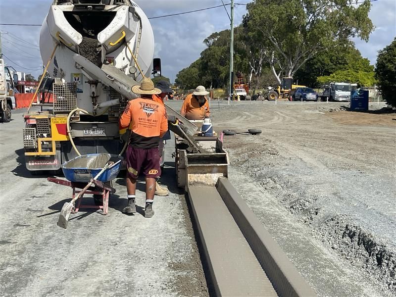 A Concrete Walkway Is Being Built In A Yard  — Flash Concreting Pty Ltd In Nindaroo, QLD