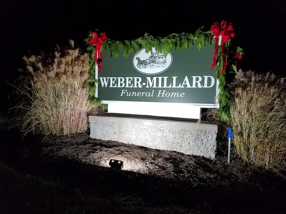 The Outdoor Sign of Weber-Millard Funeral Home in Russellville, MO. Call McKague-Millard Now.