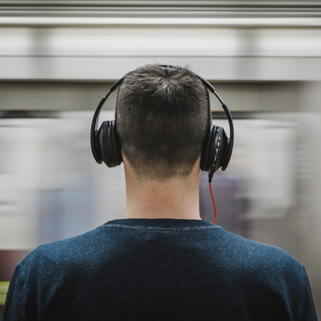 Man with headphones on - Adults with Autism