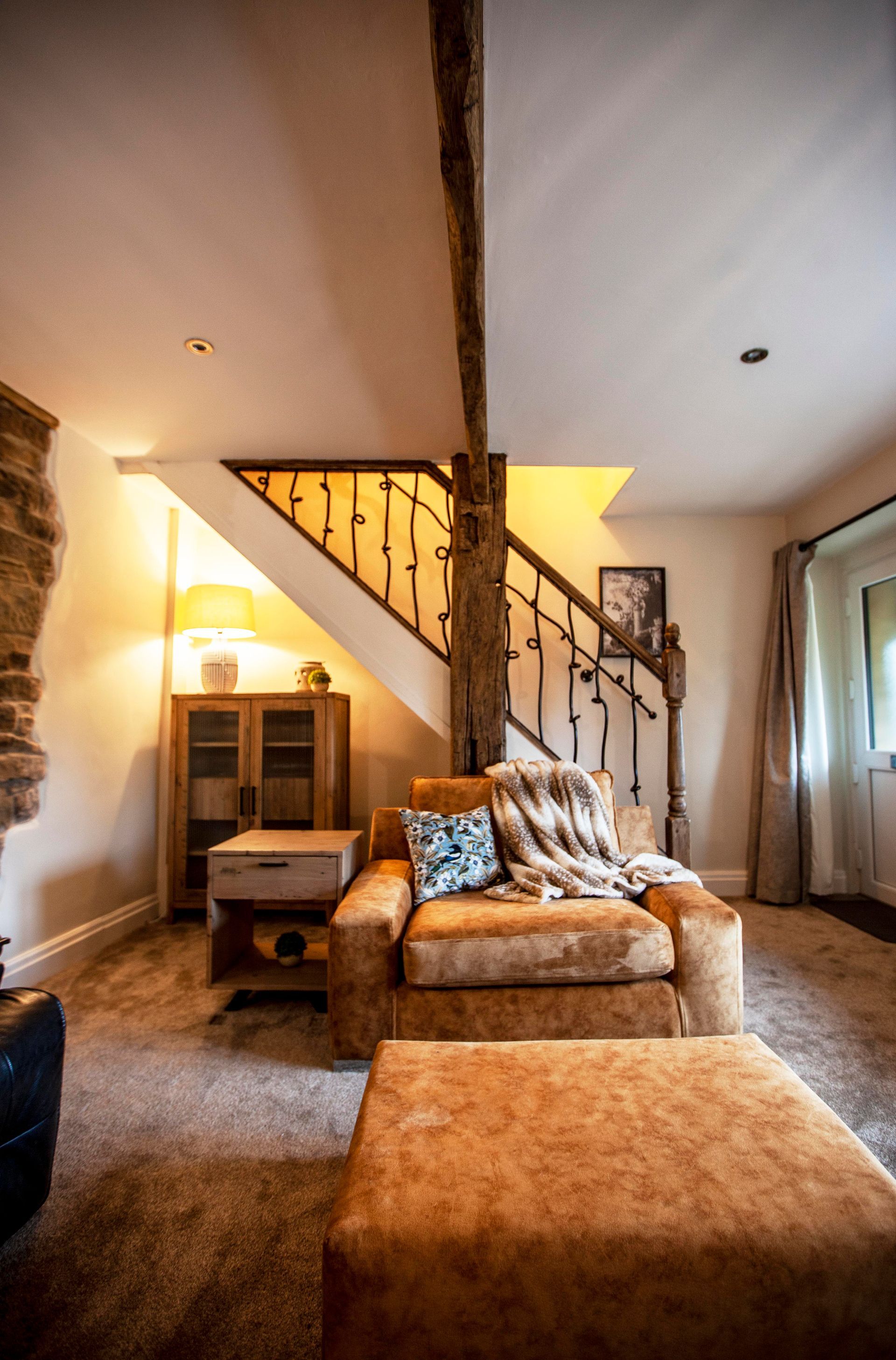 living room and iron stairs