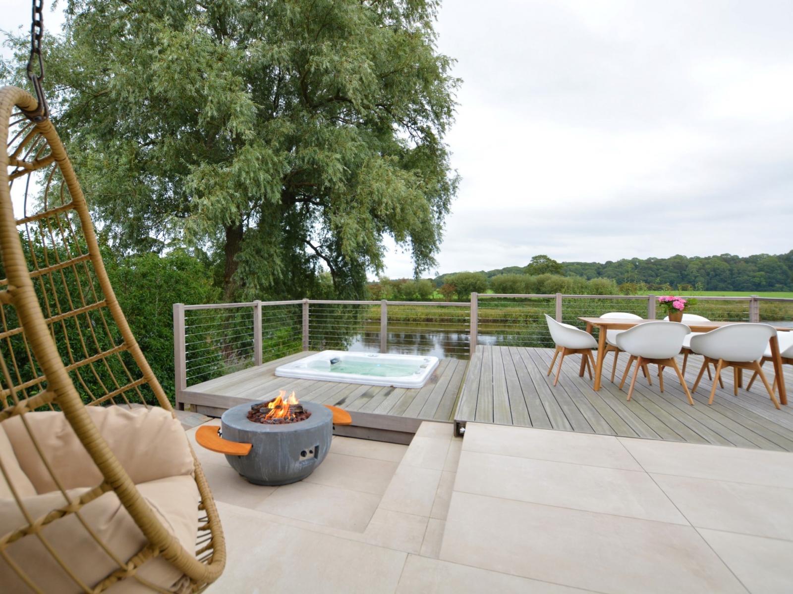 Riverside decking, hot tub, fire pit and outdoor seating