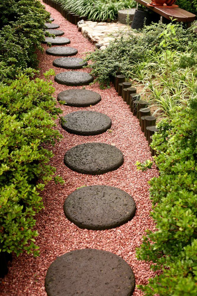 Path Of Circular Stones And Red Gravel — Landscapers in Port Macquarie, NSW