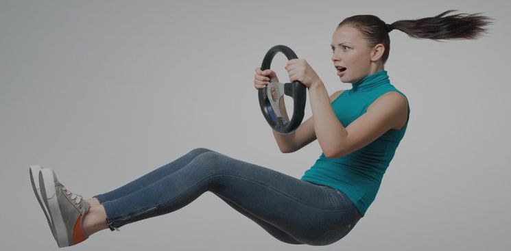 Tandem Growth.  A woman is flying through the air while holding a steering wheel.